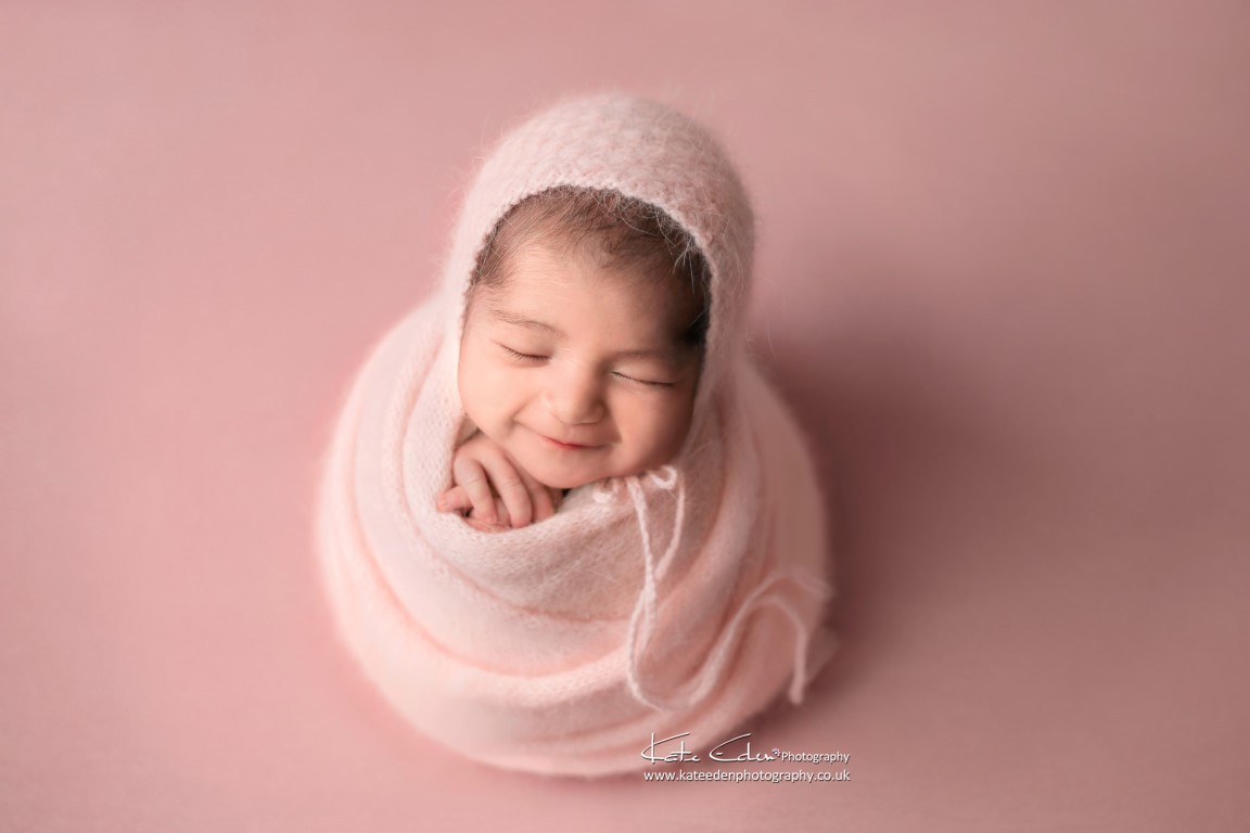 Newborn baby girl in pink - Kate Eden Photography - Buckinghamshire newborn photographer