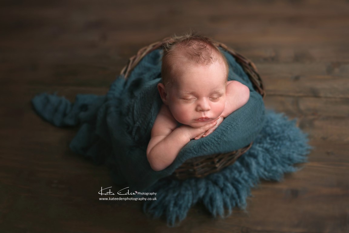 Newborn baby boy in teal - Kate Eden Photography - Milton Keynes newborn photographer