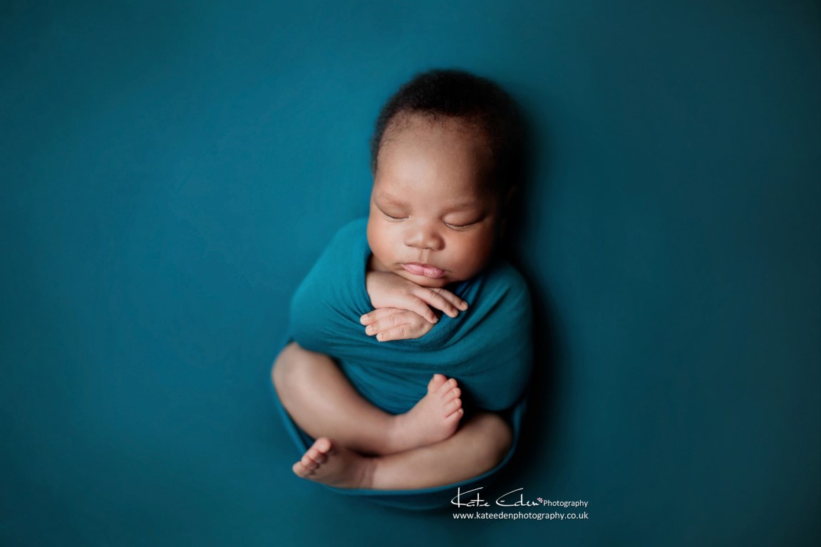 Newborn baby boy in teal |newborn photoshoot in Milton Keynes |Kate Eden Photography